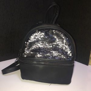 Black Steve Madden backpack w/ reversible sequins